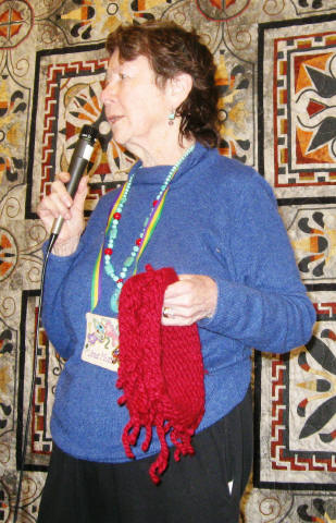 June Moes, Knitted neck scarf.